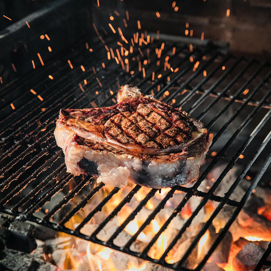 closeup of a steak grilled by renowned butcher Dario Cecchini
