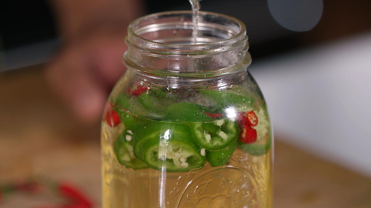 Hot Vinegar. This is an essential item to have on hand in your pantry. Ingredients marinate in a jar for a month and bring tons of complexity to any dish.