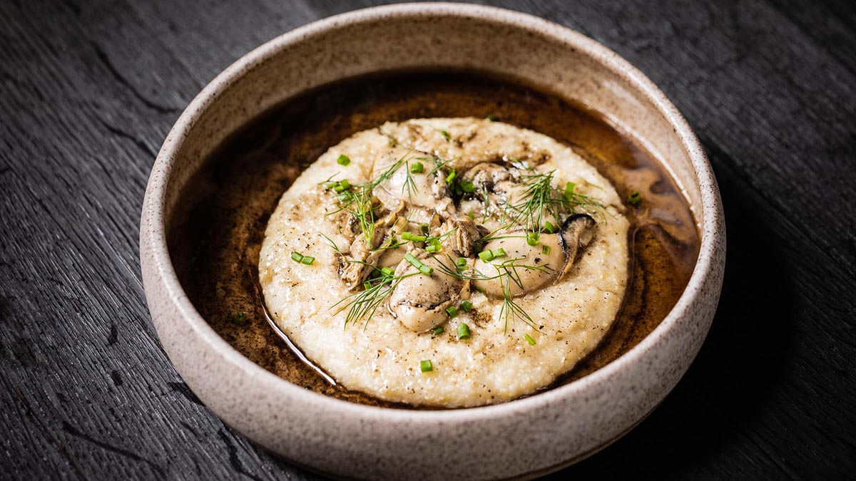 Oysters & Grits in Bourbon Brown Butter. Edward revisits the Southern classic dish of shrimp and grits with his own unique take that combines his love of bourbon and oysters.