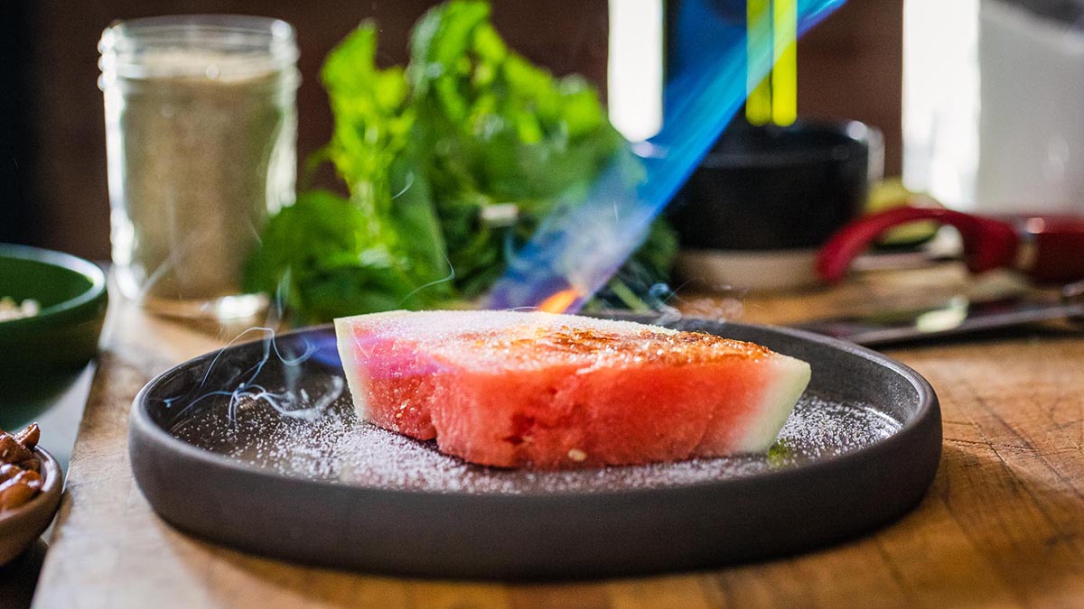 Watermelon Brûlée. This crunchy watermelon Brûlée brings an element of surprise to this dish.