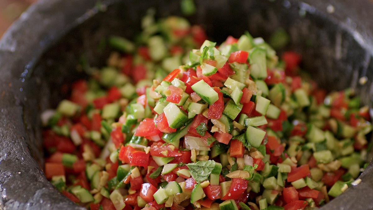 Arabic-Israeli Salad. An Israeli mezze spread wouldn’t be complete without this chopped Arabic-Israeli salad filled with fresh and crunchy chopped vegetables, and simply dressed with lemon and olive oil.