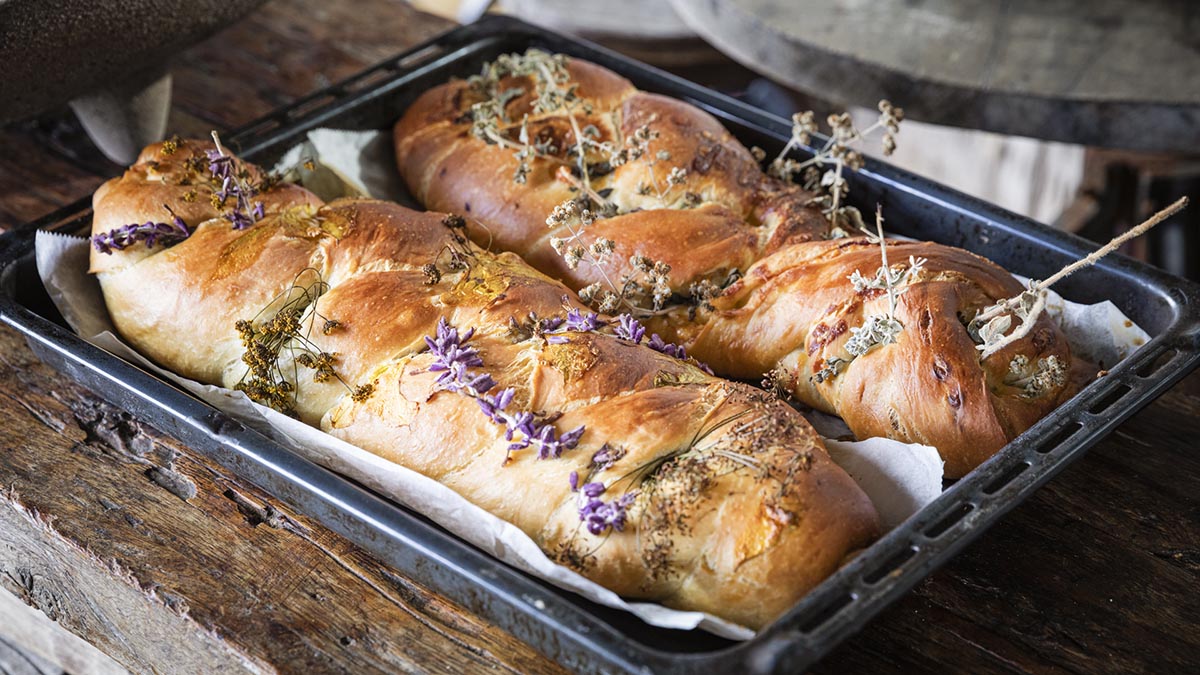 Garlic Confit Challah. Erez takes Challah bread to new places with garlic confit adding a sweet, roasted flavor and satisfying texture. Try it using sundried tomatoes or pesto, or whatever you can dream of!