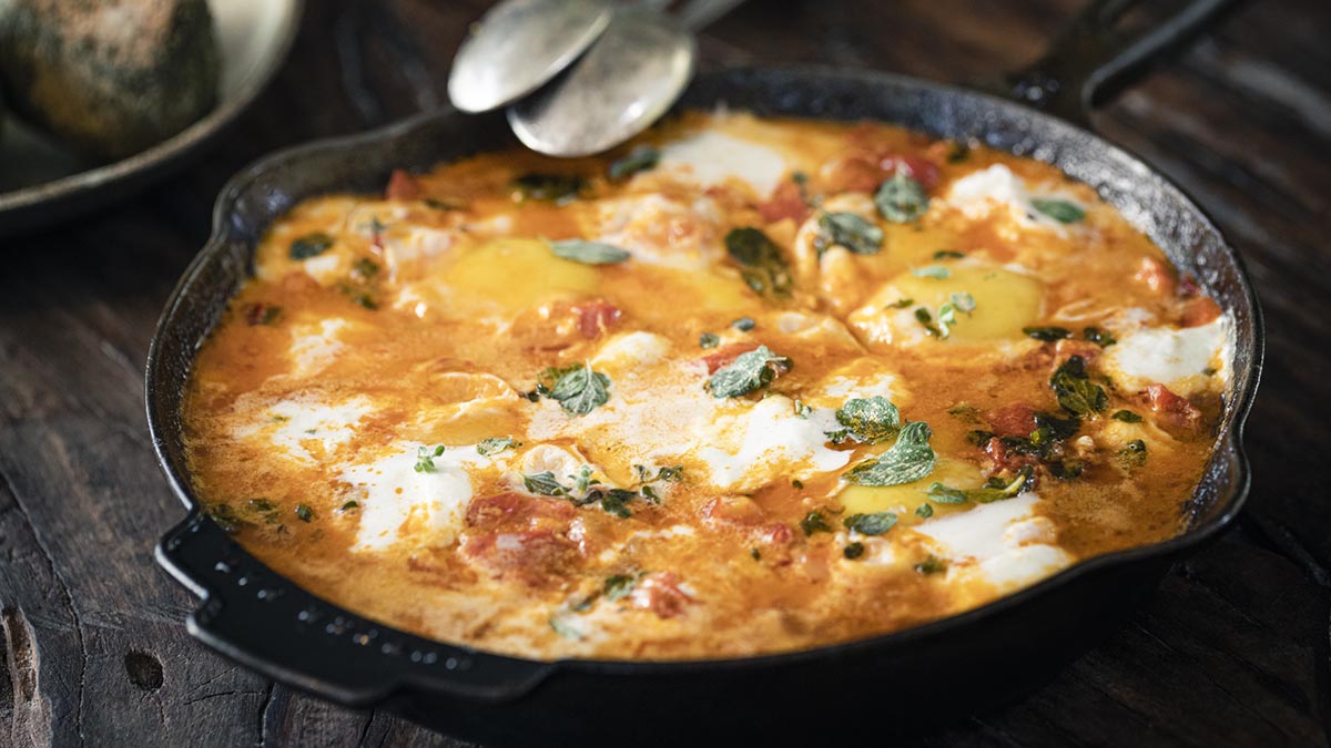 Shakshuka. Learn the secret to make the most flavorful tomato-based egg dish and your weekend breakfasts will never be the same.