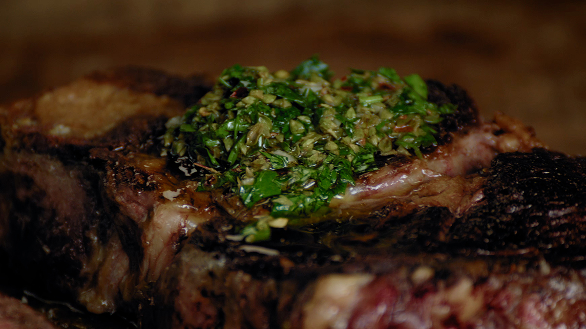 Chimichurri Sauce. Learn how to make the traditional Argentinean herbaceous sauce that goes alongside any steak, or other grilled meats.