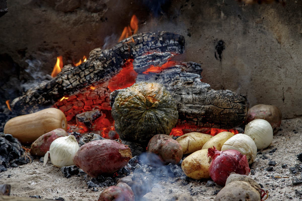 Rescoldo Vegetables. A great vegetarian side that will have everyone wanting more. Learn about the rescoldo method of cooking, burning vegetables in ashes.