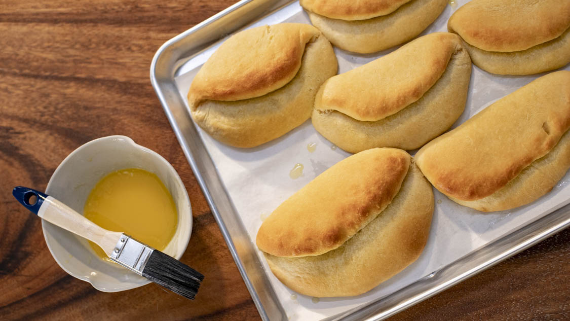 Coco Bread Dough. You’ll fall in love with this fluffy, simple dough that will elevate your patty game. But why stop there? You’ll discover coco bread rolls can be your new go-to sandwich bun.