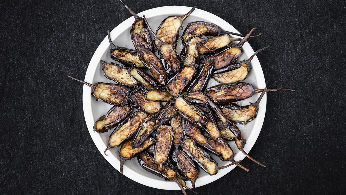 Roasted Eggplant. Luscious globe eggplants are roasted with aromatics and spices to create an unforgettable side for your next dinner party. Learn the eggplant essentials, like how to score, salt, and sweat them to release any bitter juices. Caramelize onions, “candy” your garlic, and top with whey to take this dish to another level.